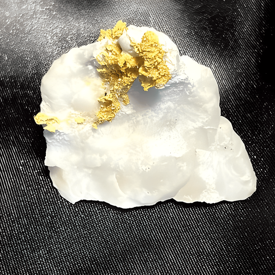 Gold accents on white sculpture